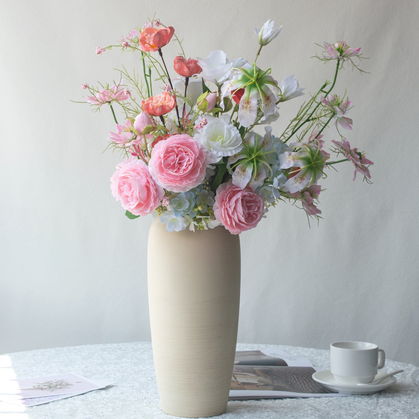 Handmade Spring Pink Artificial Flowers arrangement in a vase with pink and white flowers.