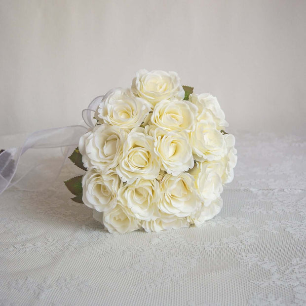 Handmade realistic rose Artificial bouquet featuring white rose flowers arranged elegantly.