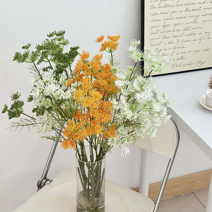 Realistic Artificial Lace Flowers featuring vibrant orange blossoms in a vase, perfect for enhancing the aesthetic of a workspace.