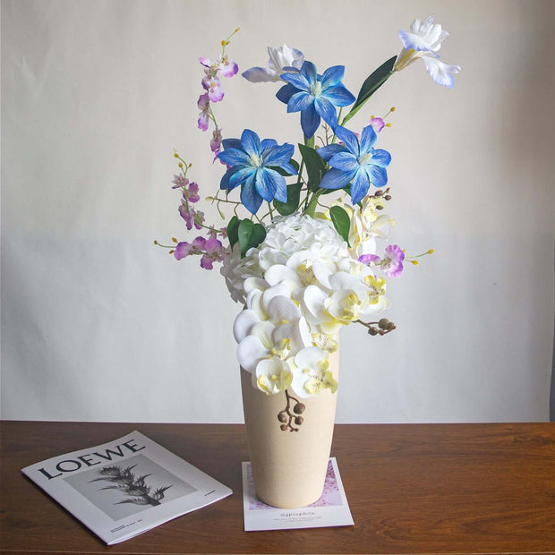 Handmade high-realism Orchid artificial flower bouquet in a decorative vase with blue and white flowers.