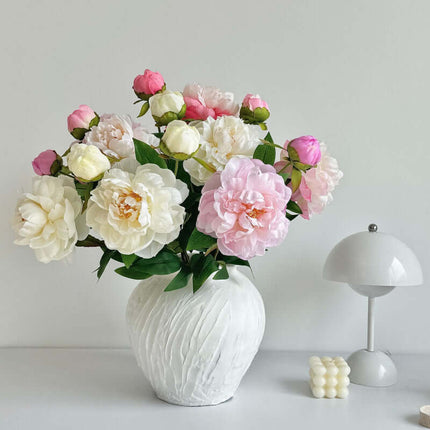 High Realistic Peony Artificial Flowers showcasing a combination of white and pink blooms in a vase, great for bringing a charming accent to interior decor.