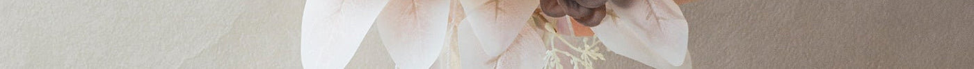 Romantic Artificial Flowers in soft pastel colors held by a hand, perfect for weddings.