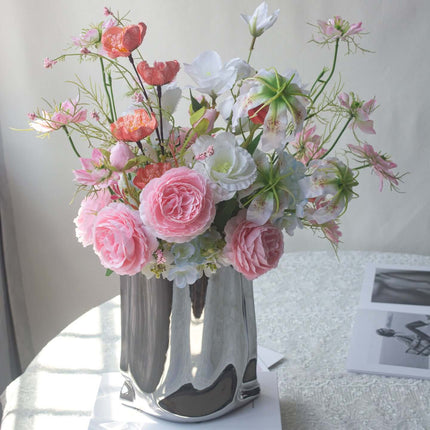 Handmade Pink-white Silk artificial flower arrangement in a shiny silver vase, featuring realistic blooms and vibrant colors.